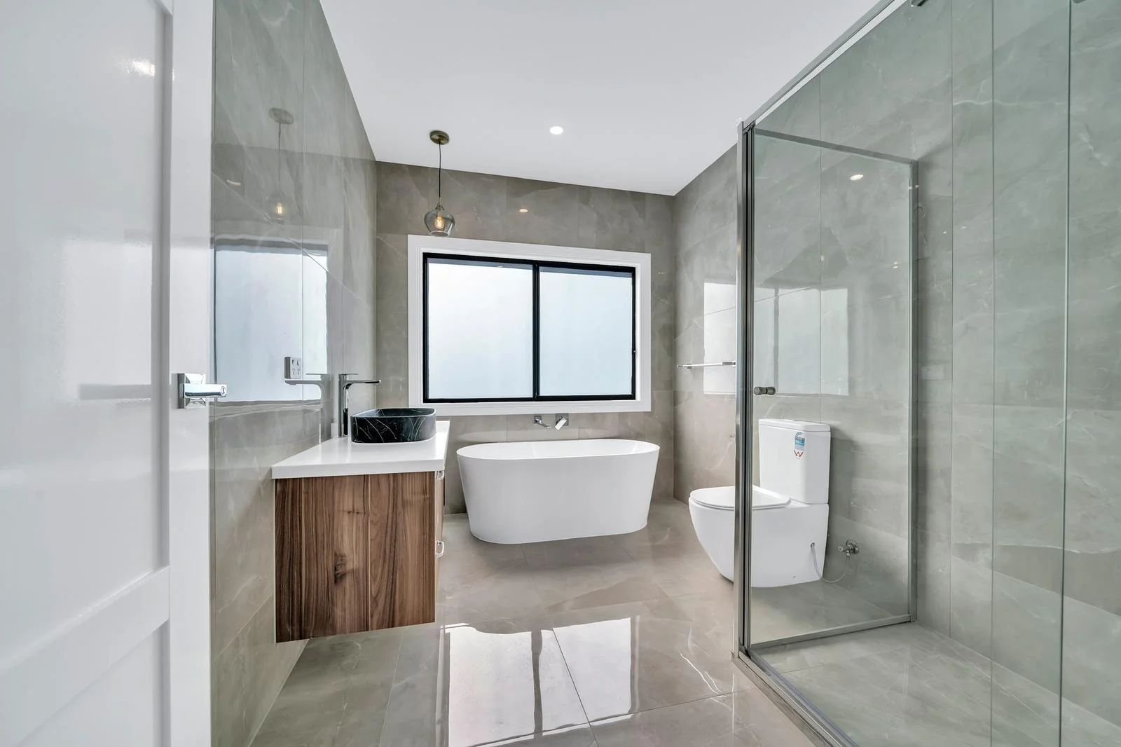 Bathroom with freestanding bath and walk-in shower